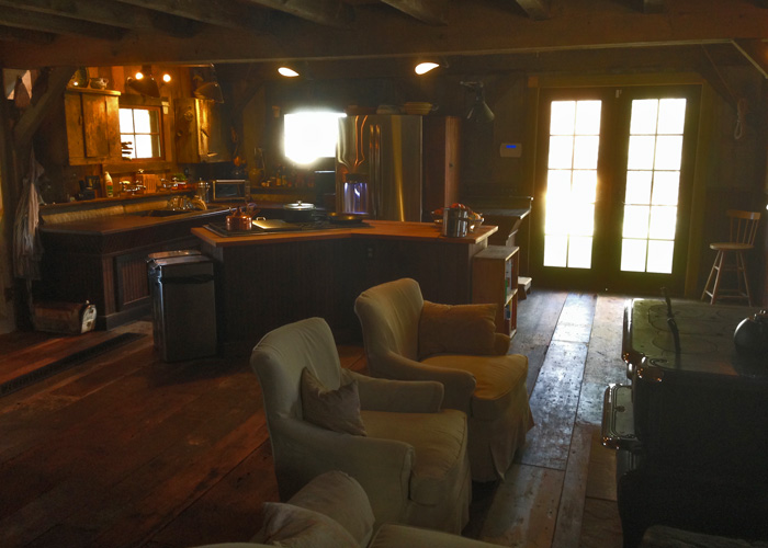 20x30 Cabin interior photo living room kitchenette island post beam kit for sale colorado