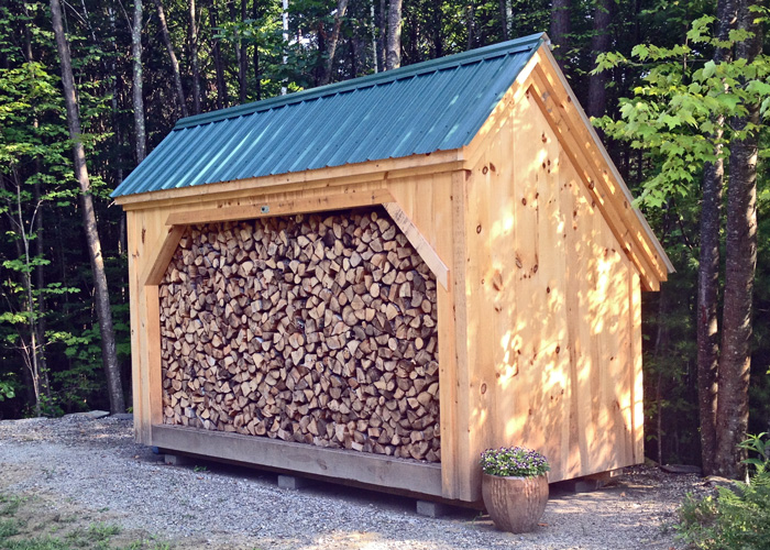 6x14 Woodbin - shown full of perfectly stacked firewood.